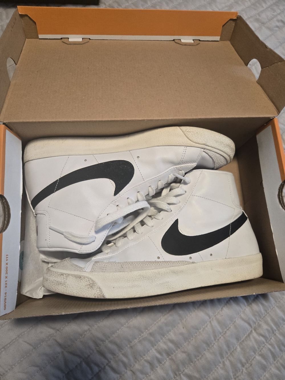 Nike Men’s White High-Top Sneakers with Black Swoosh